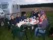 Some of the group who stayed on Saturday night (and helpers) enjoying the barbeque in the evening sun at Kelsall Hill - Pat Guerin